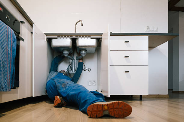 Professional Emergency Plumber technician working in Visalia, CA
